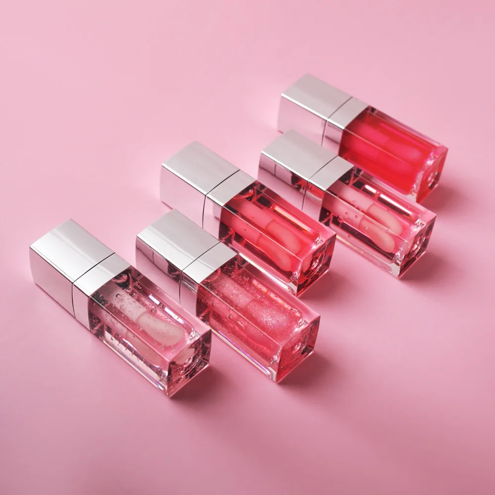 Wholesale Private Label Glossy Lip Oil Vegan Organic Fruit Flavor Vitamin E Moisture Lip Plump Lip Care Oil OEM ODM