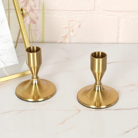 Small metal gold tapered candle wick holder for wedding banquet