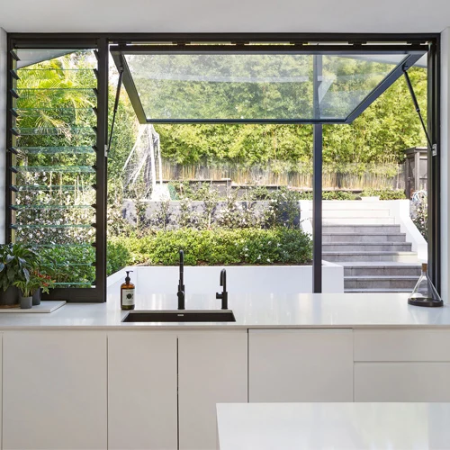 Kitchen servery awning window with gas strut