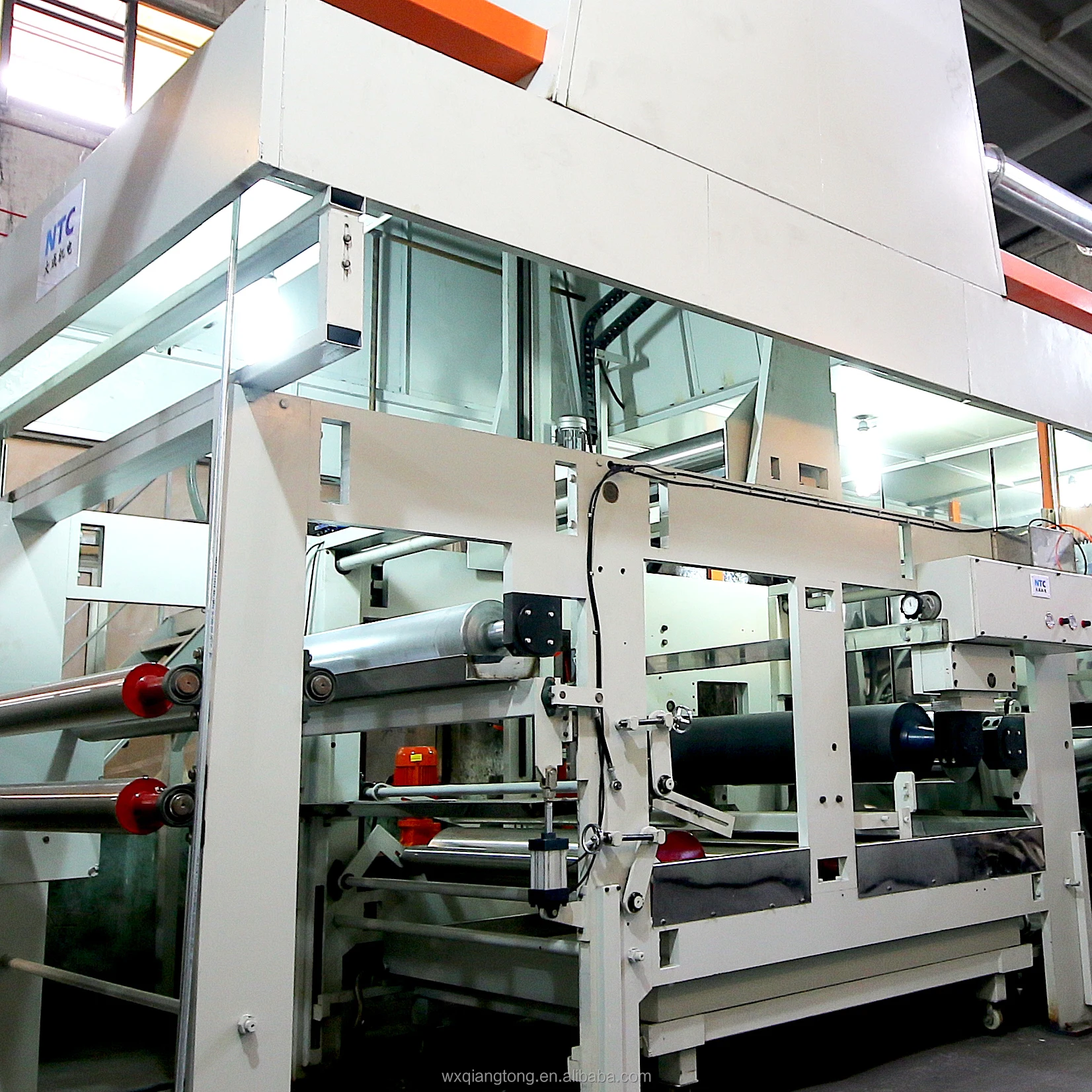 Automatic melamine paper impregnation line