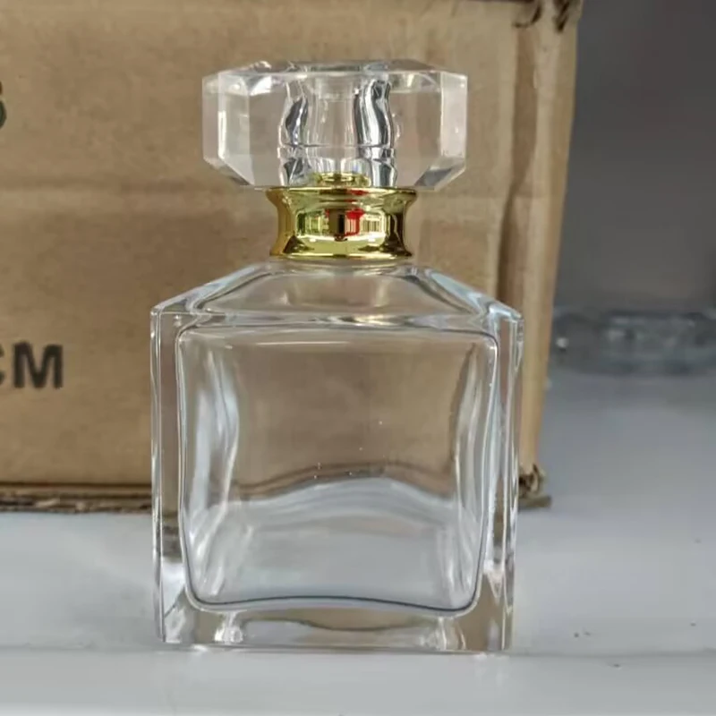 Newest Style Luxury Fragrance Spray Bottle 70ml Transparent Glass Perfume Bottle with Transparent Lids