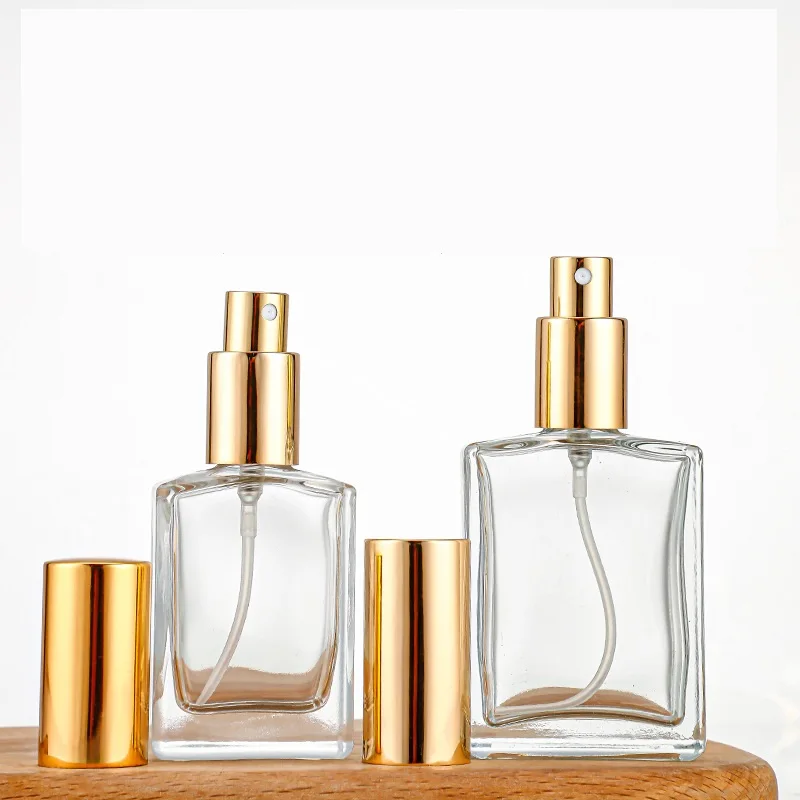 Luxury 30ml 50ml 100ml Clear Glass Perfume Atomizer Bottle Flat Shoulder Square Design with Fine Mist for Cosmetics