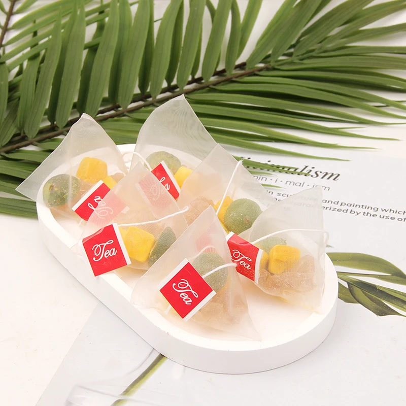 Wholesale Dried  Flavor Tea Pyramid Triangle Tea bag Mixed sweet fruit Kumquat Passion Tea