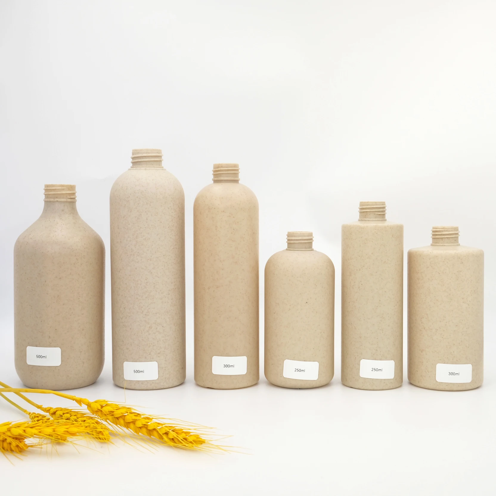 ECO Biodegradable 50ml 100ml 150ml 250ml 300ml 350ml 500ml HDPE Wheat Straw Lotion Empty Bottle with Bamboo Pump