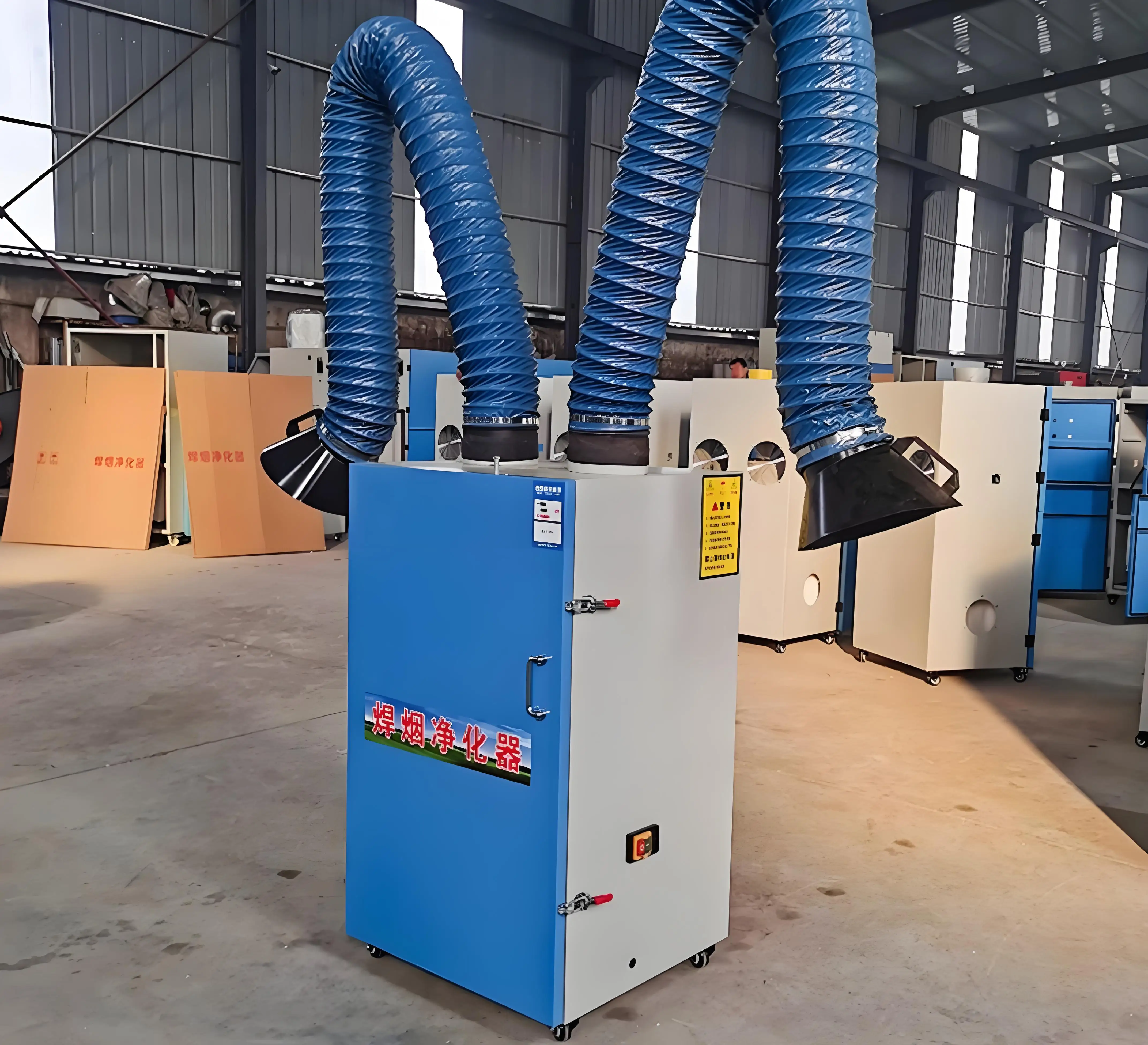 Portable welding fume extractor for welding fume collection in metal fabrication manufacturing plant