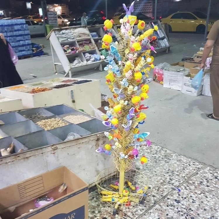 RUIMEI Rotating Candy Display Rack For Retail Store Yellow Candy Racks Display With Baskets For Supermarket Shop