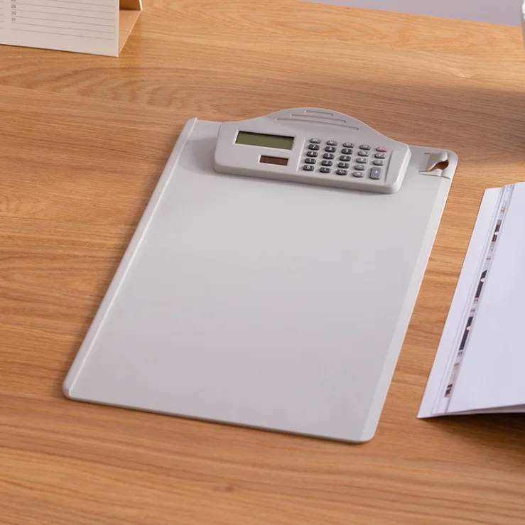 Plastic clipboard with calculator