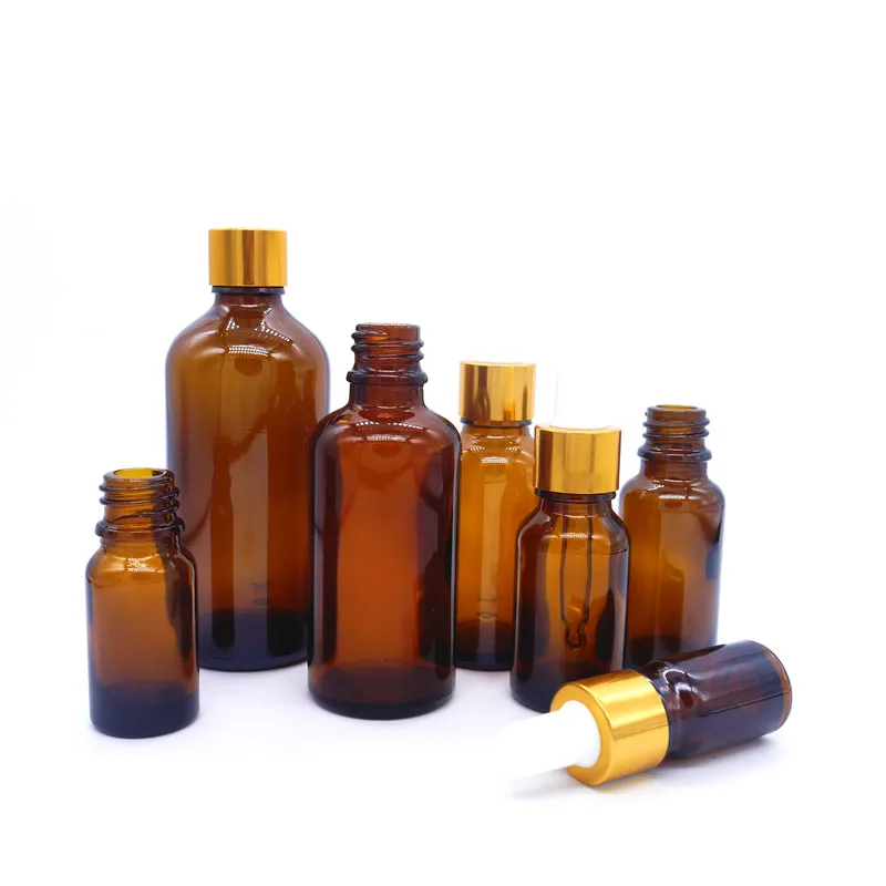 
10ml 15ml 20ml 30ml 50ml 100ml Golden Metallic Dropper Amber Glass Liquid Bottle Essential Oil Bottle With Dropper 