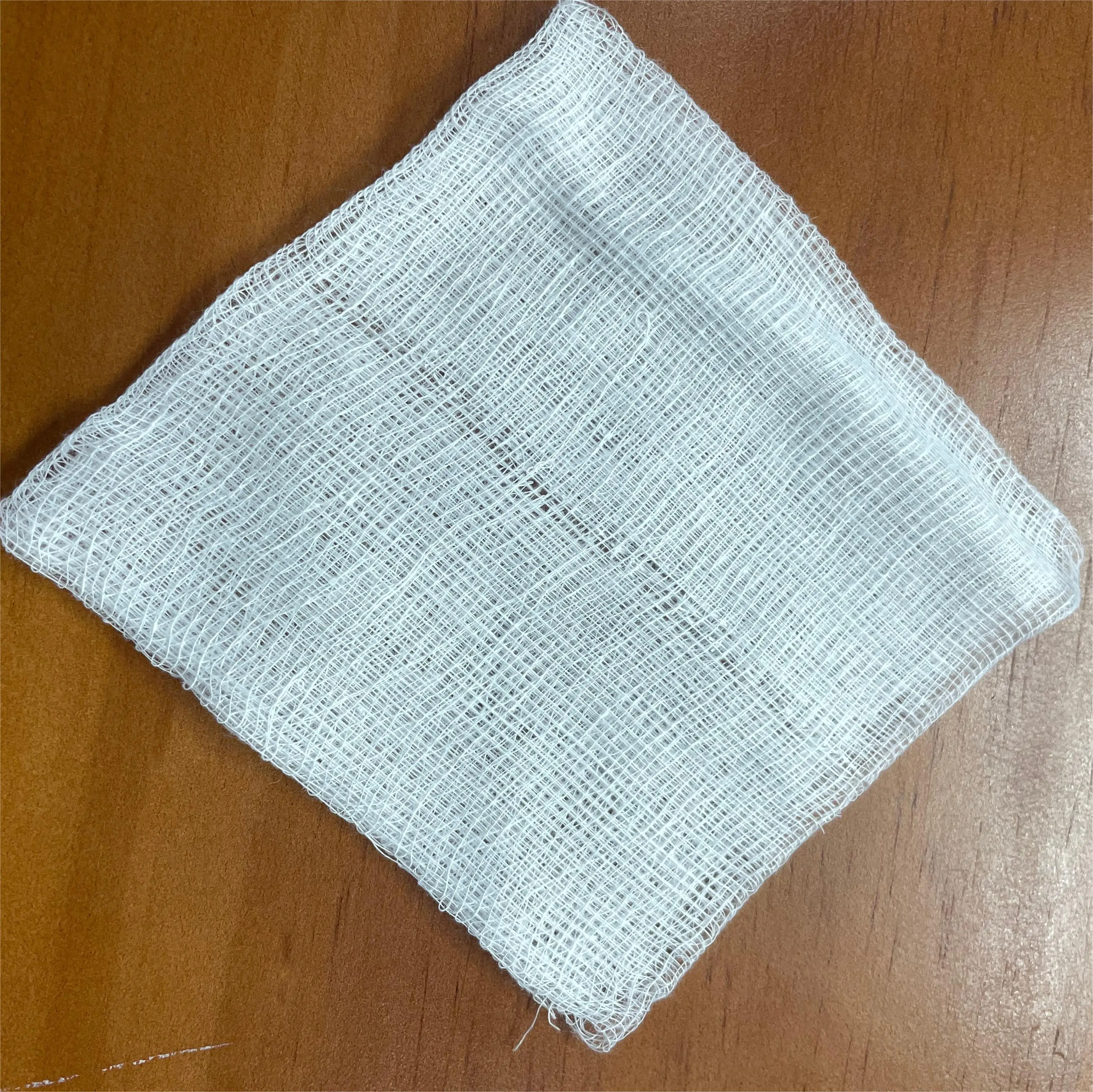 Cheap price disposable medical consumables sterile non-woven gauze pad