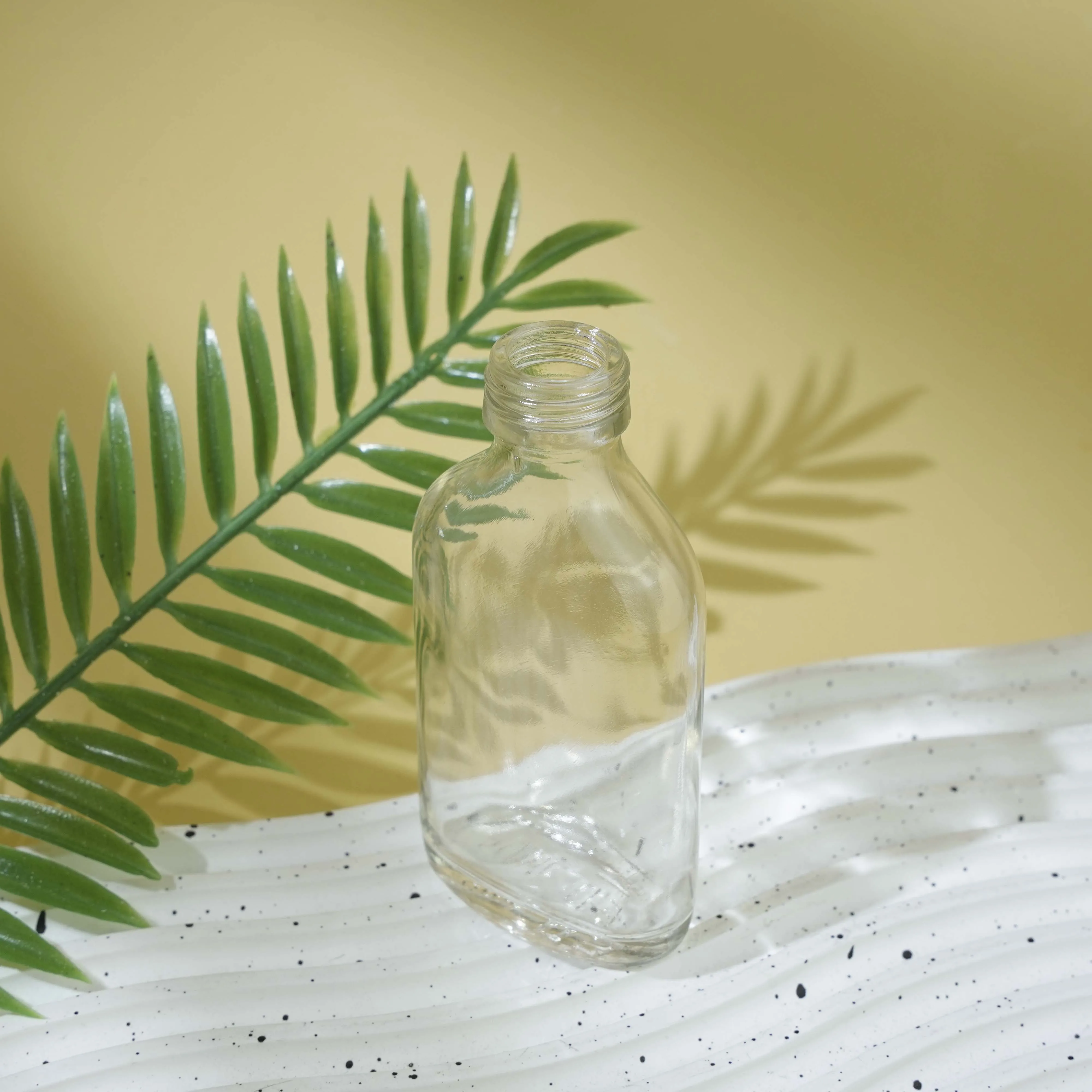 Berlin Packaging 50ml Small Liquor Sample Oval Juice Whiskey Spirit Bottle Vodka Water Glass Bottle For Carbonated Drinks