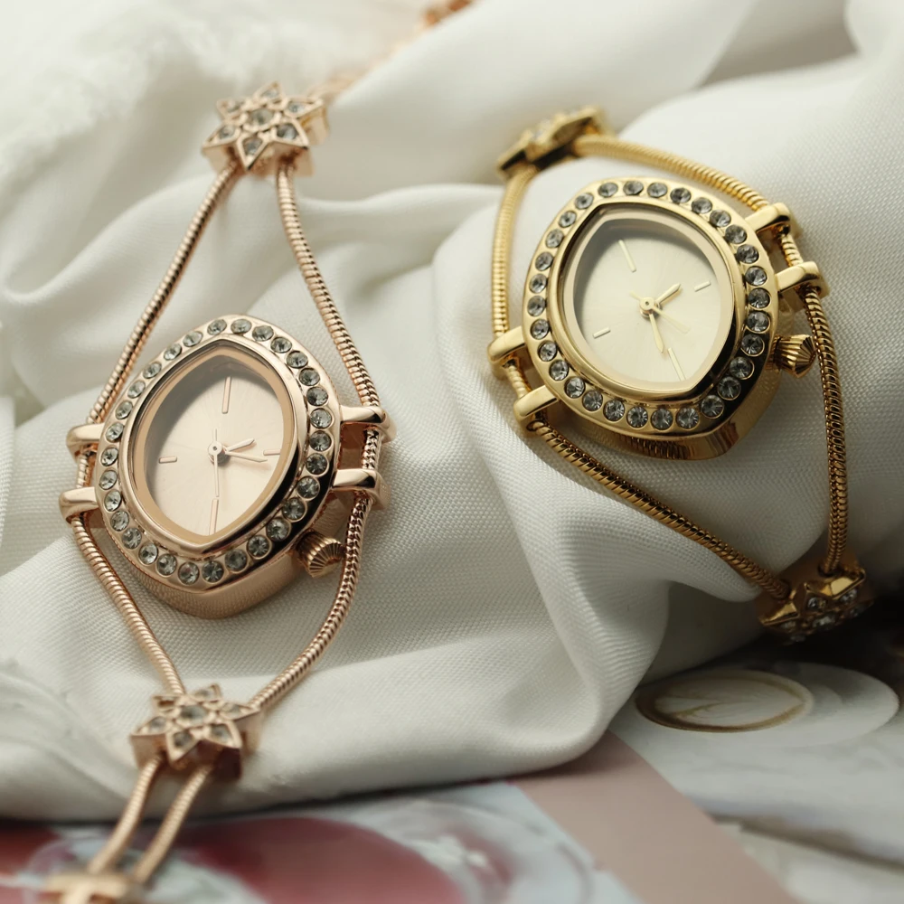 Alloy diamond lady watch top brand custom eyes special shape new style popular luxury OEM wholesale women girls watch in bulk
