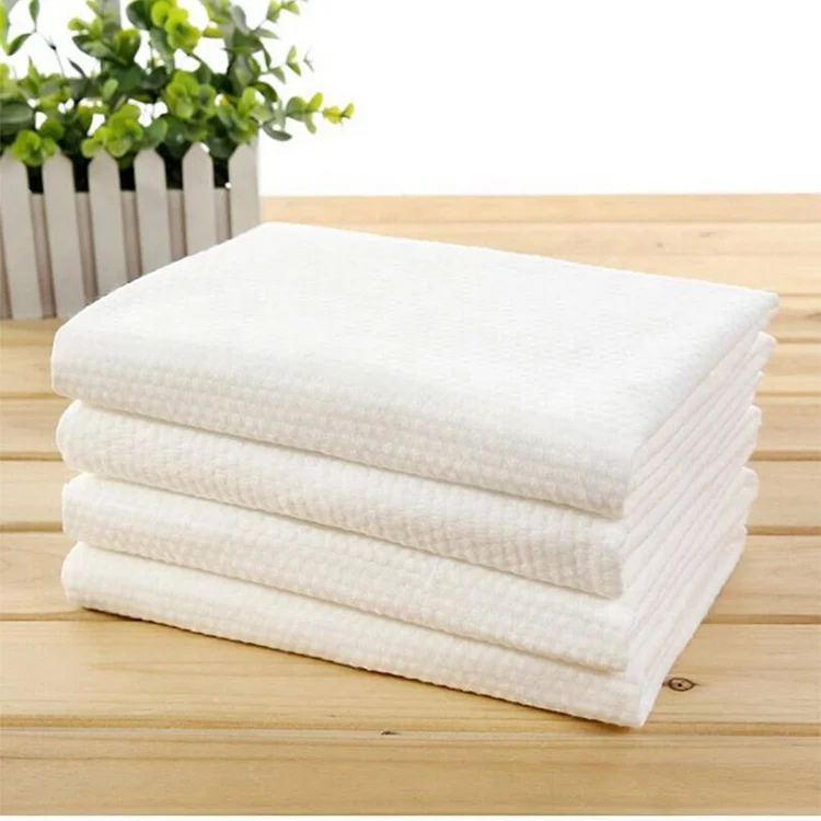 Wholesale Non-woven Fabric Adult Business Hotel Use Towel 100% Cotton White Disposable Bath Towel