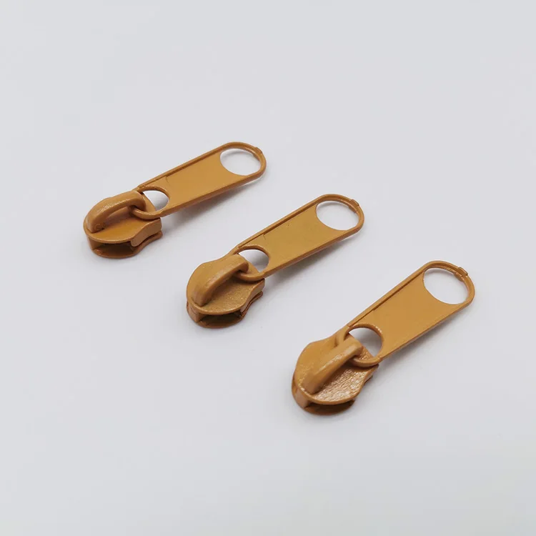 Cheap slider  khaki metal zips with fancy pullers number 5 zipper pull