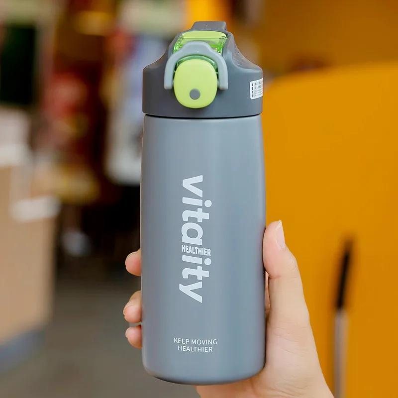 One-handed opening suction nozzle type thermos cup stainless steel bouncing lid sports water bottle