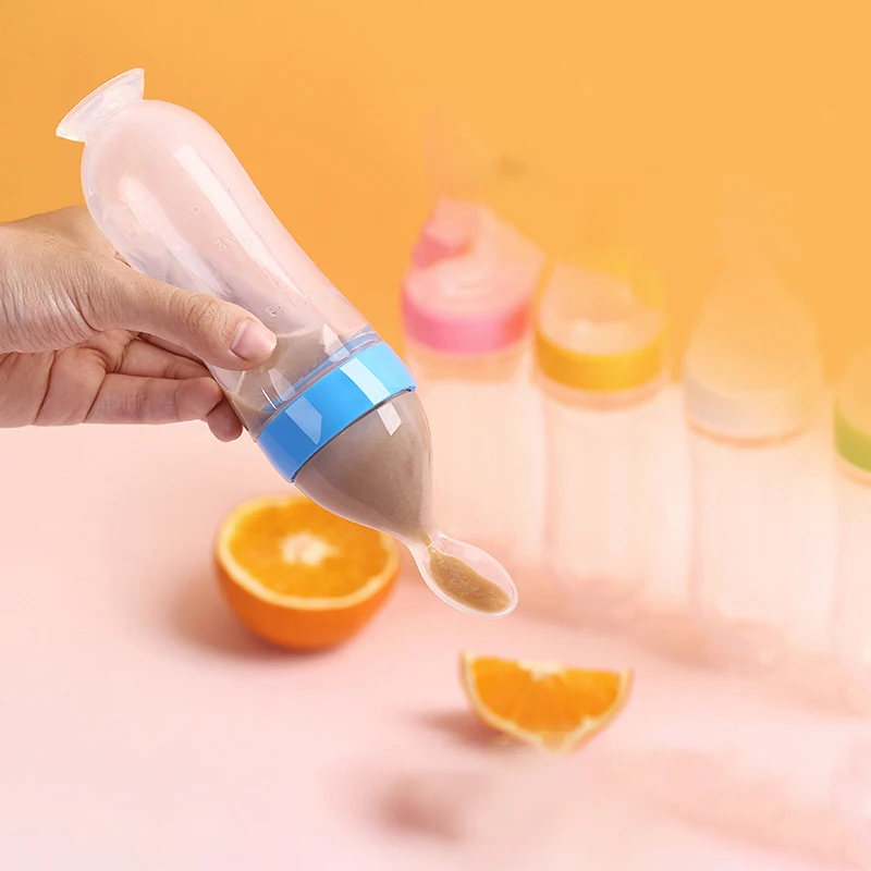 Hot Sale Squeezable Silicone Bpa Free Baby Feeding Food Bottle With Spoon Feeding Bottle Set