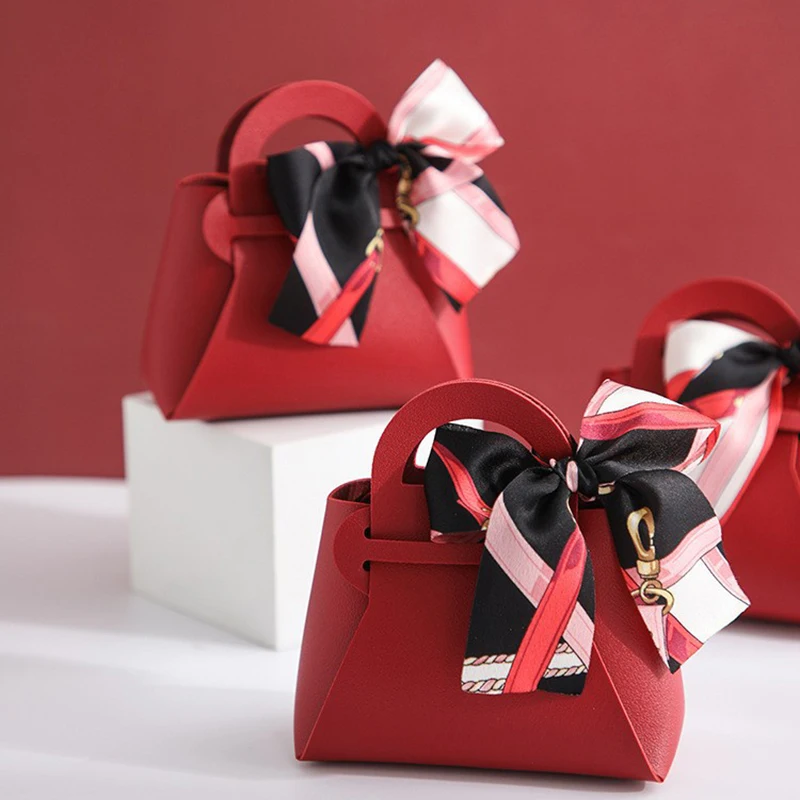 Розовая сумка из искусственной кожи с лентой