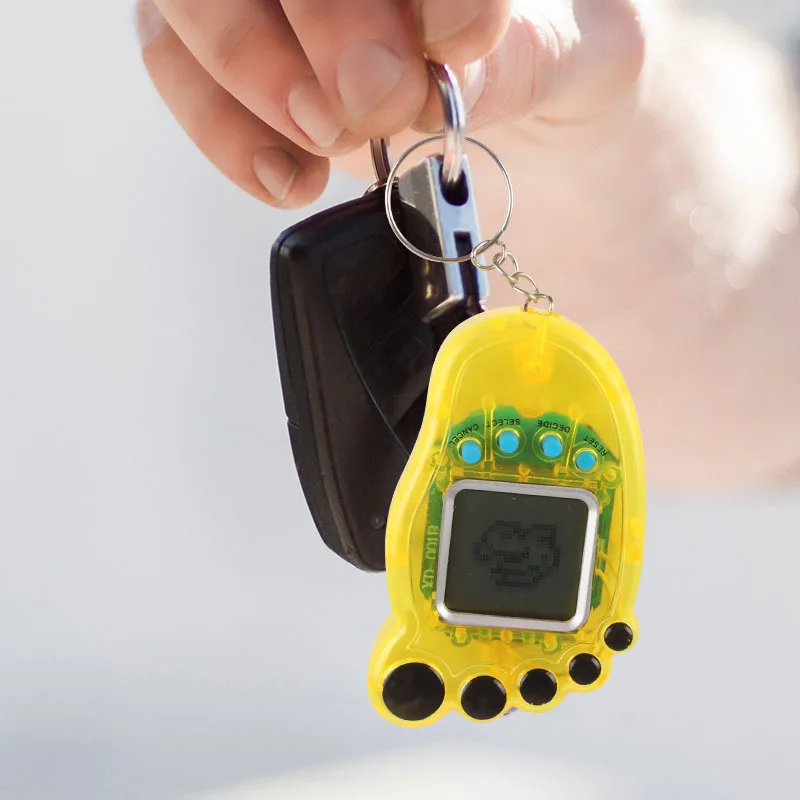 New foot mini electronic pet machine handheld mini game keychain pendant