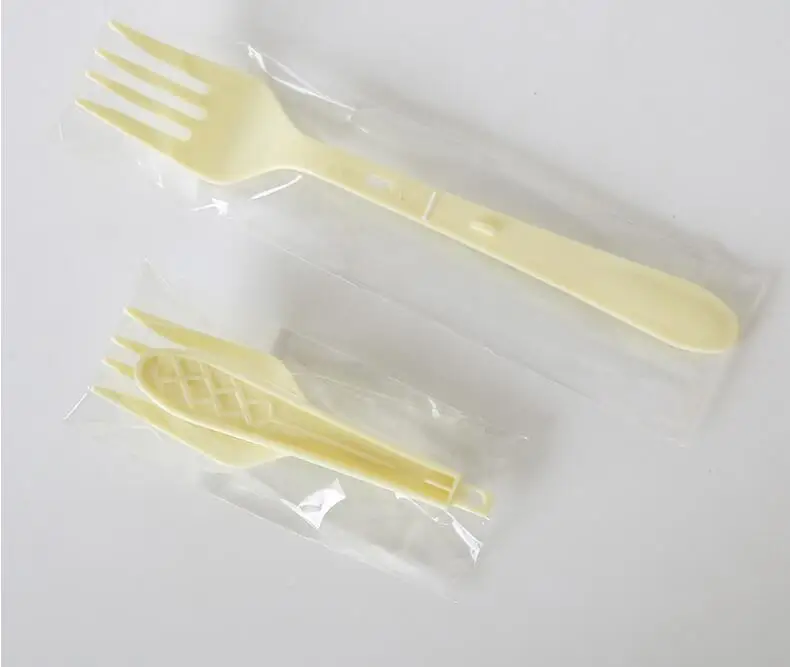 Disposable folding plastic fork and spoon spork