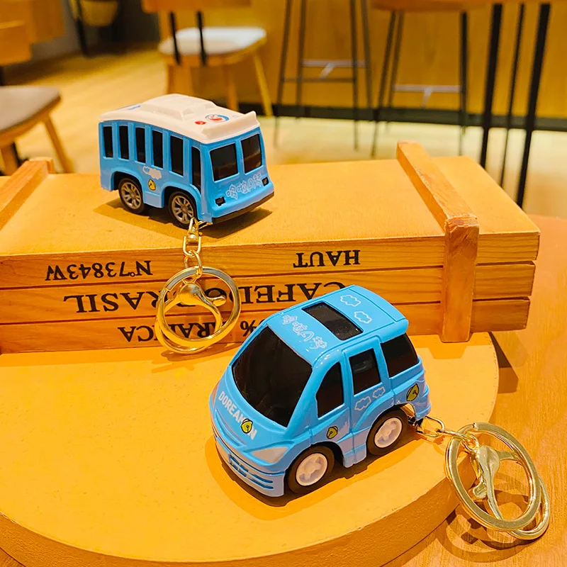 Cartoon car school bus decompression toy keychain toy wholesale