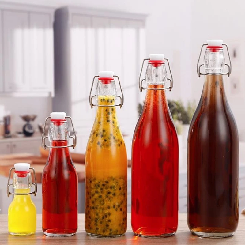 Wholesale Clasp Beverage bottle Clear Juice Drink Sealed Bottle With Lids Glass Bottle Drinking Container