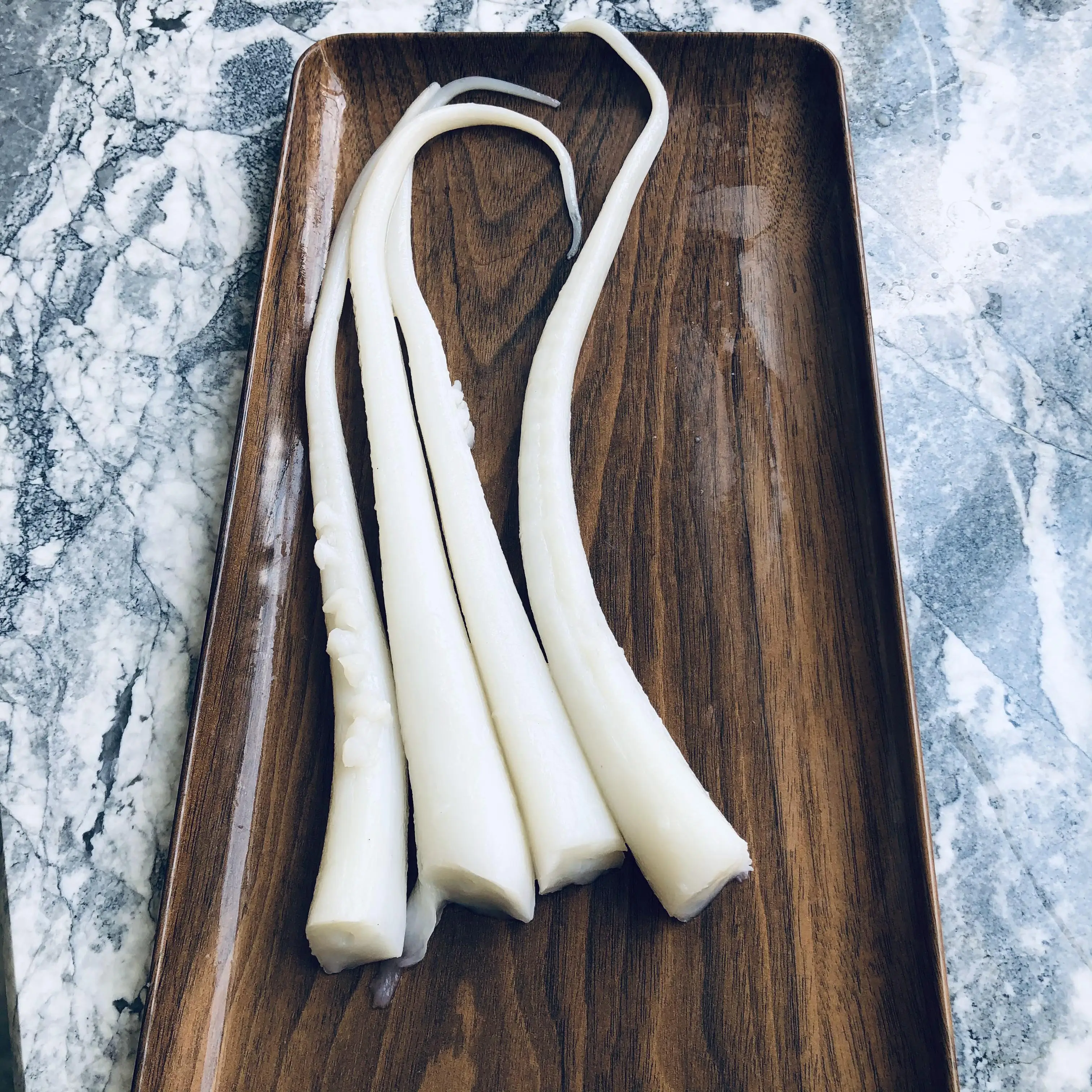 Frozen Cooked Pure Giant Squid Big Tentacles 400-700g per pcs BQF 900g on plate