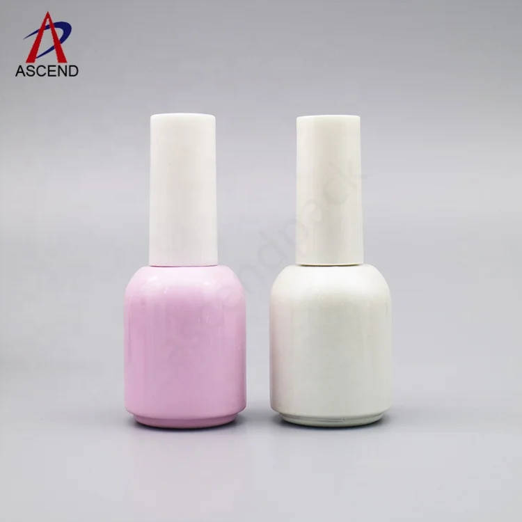 wholesale cute glossy pink color empty round shaped 10ml nail polish uv gel bottle with gel brush and long silver caps