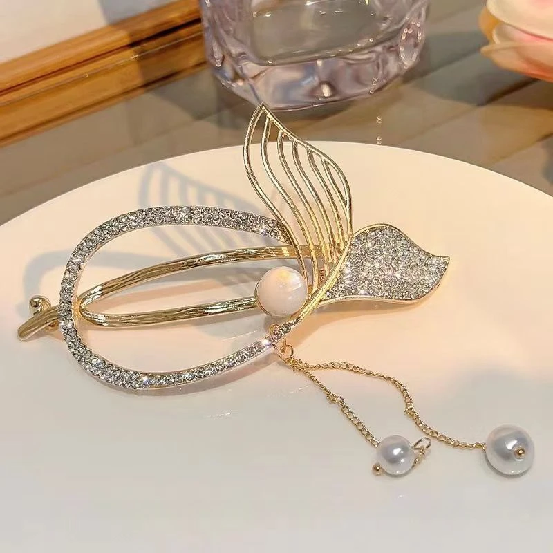 Korean version of the new high-end fringed fishtail roll high-grade plate hairpin.