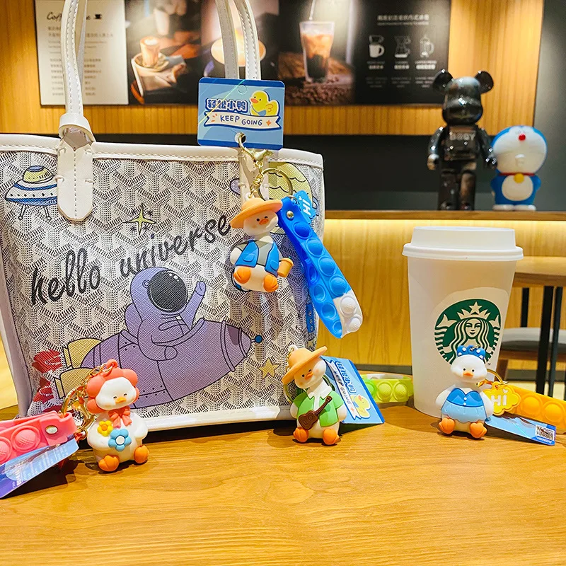 Host sell adorable Animation Comic Duckling Bracelet Wearable Push Poping bubble bracelet Duck Fidget Toy Keychain