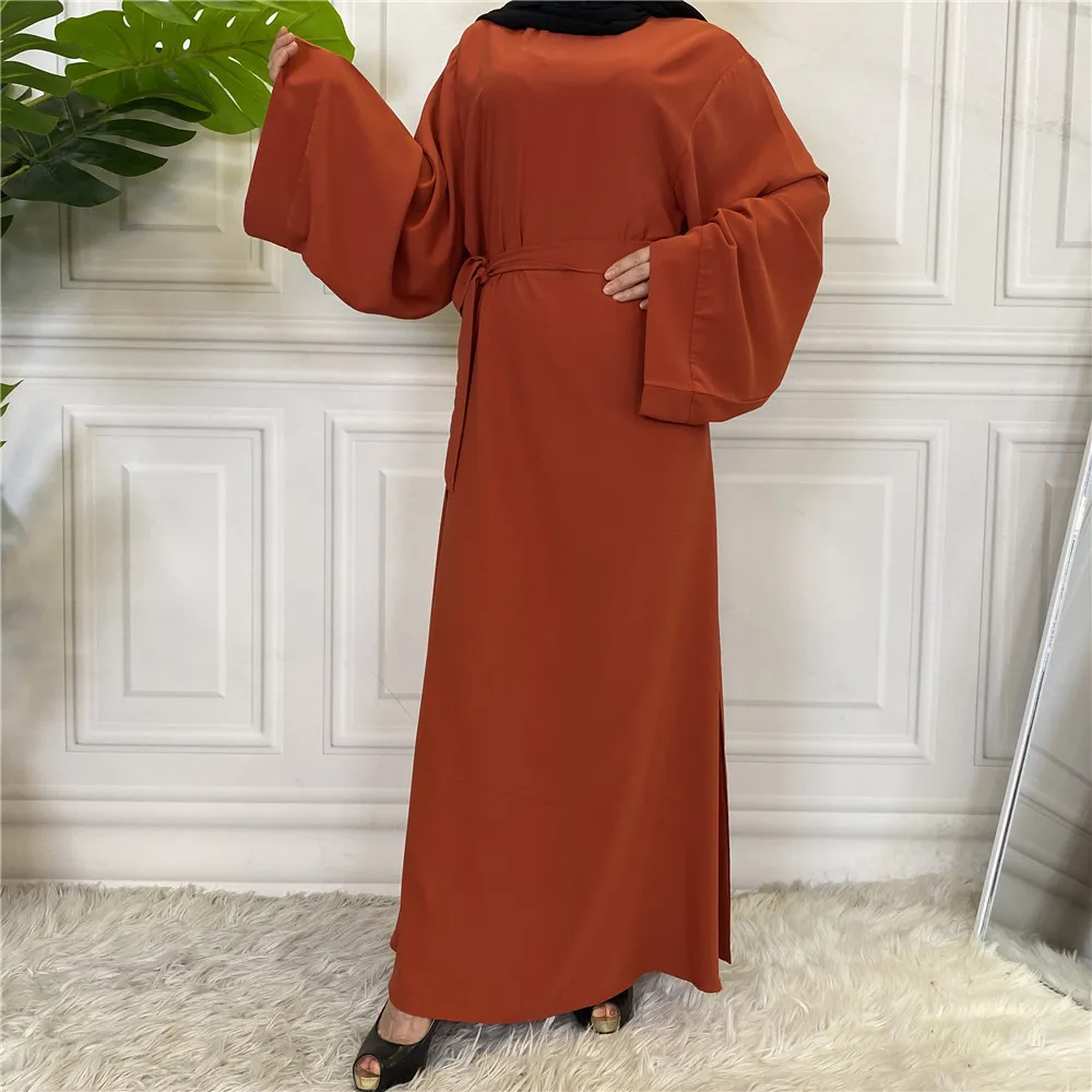 Factory ready-made wholesale solid color large lace-up women muslim dress support customization