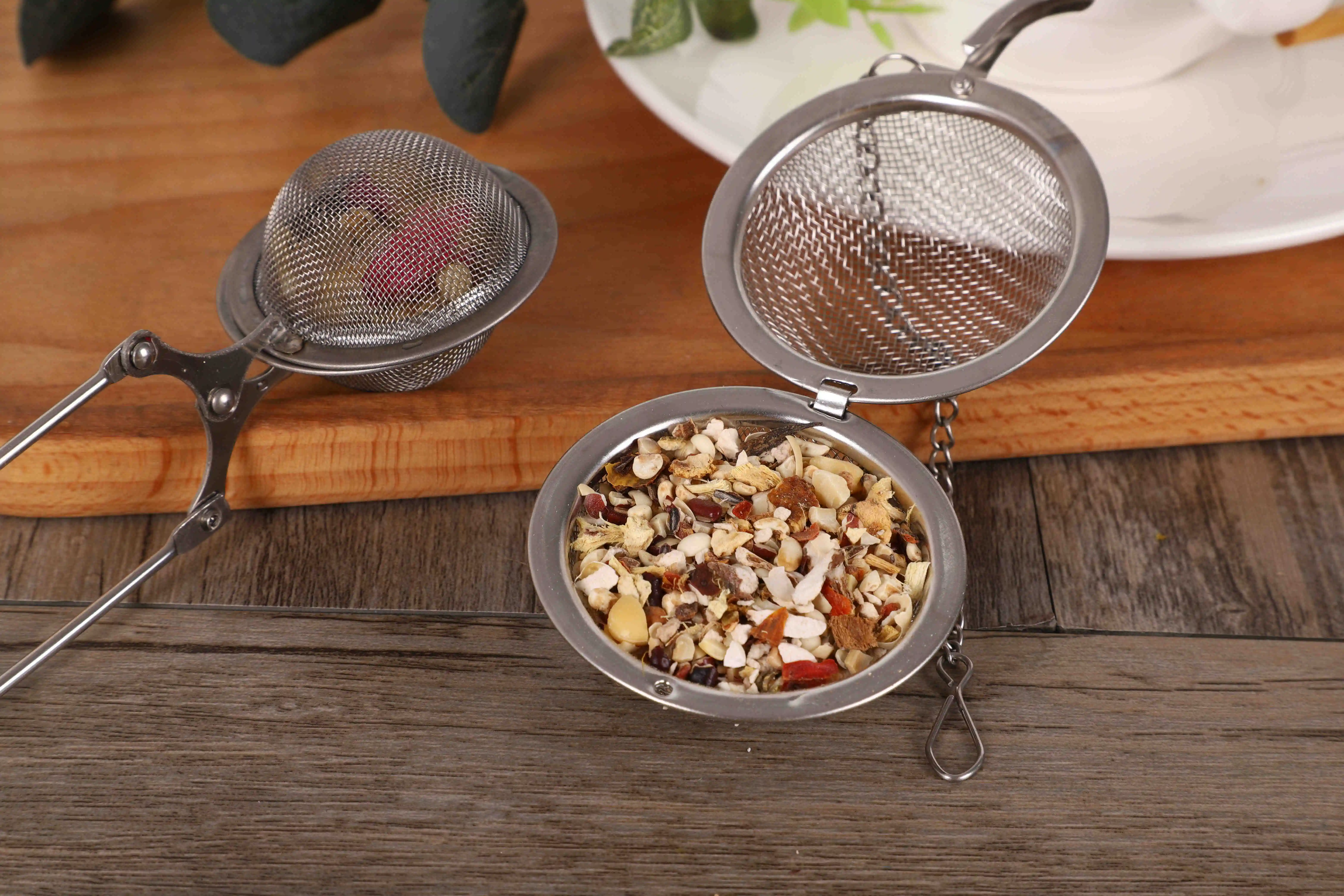 
Factory Stainless Steel Strainer Filter Loose Leaf Tea Infuser Tea infuser strainer 5.5 cm with Chain 