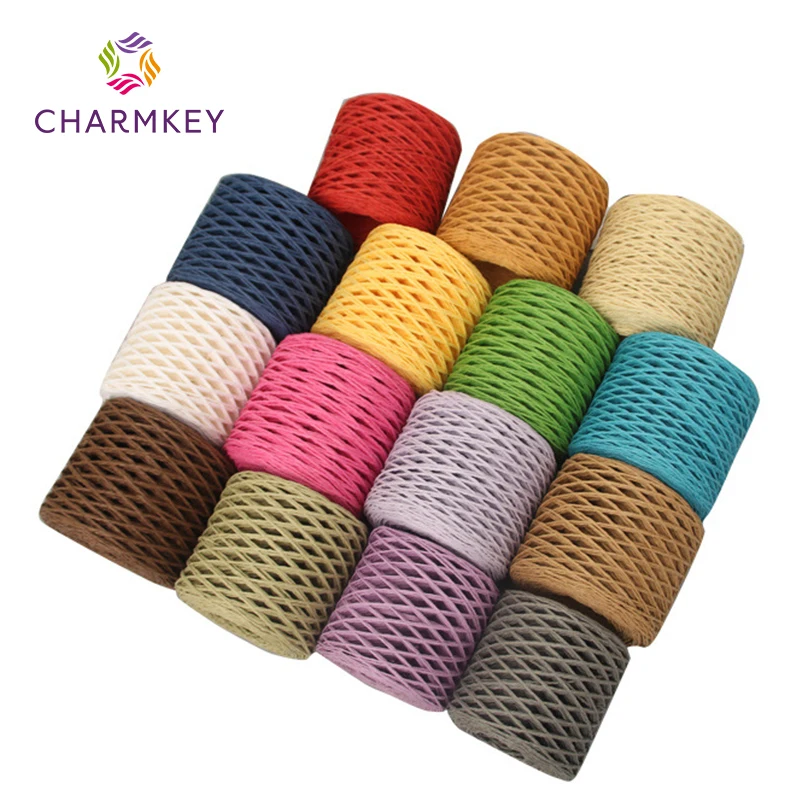 Wholesale customized 110 gram per roll colored flat paper rope 100% Paper Raffia fashion bundle gift box Raffia yarn for crochet