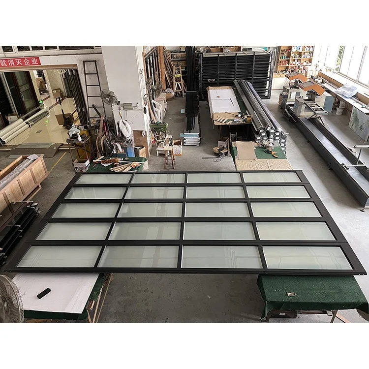 Commercial cheap aluminum alloy exterior frosted glass modern new black sectional panel garage door for homes