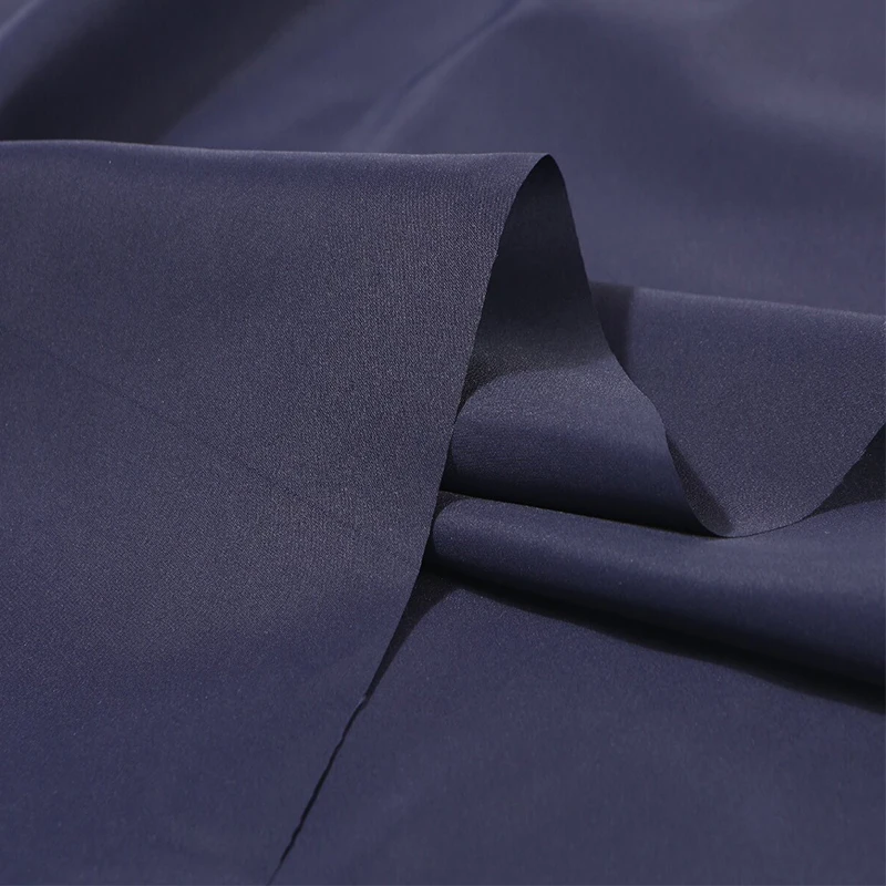 100%RPET recycled 320T fabric plain lining spring yarns can be used for waterproof down jacket home wear