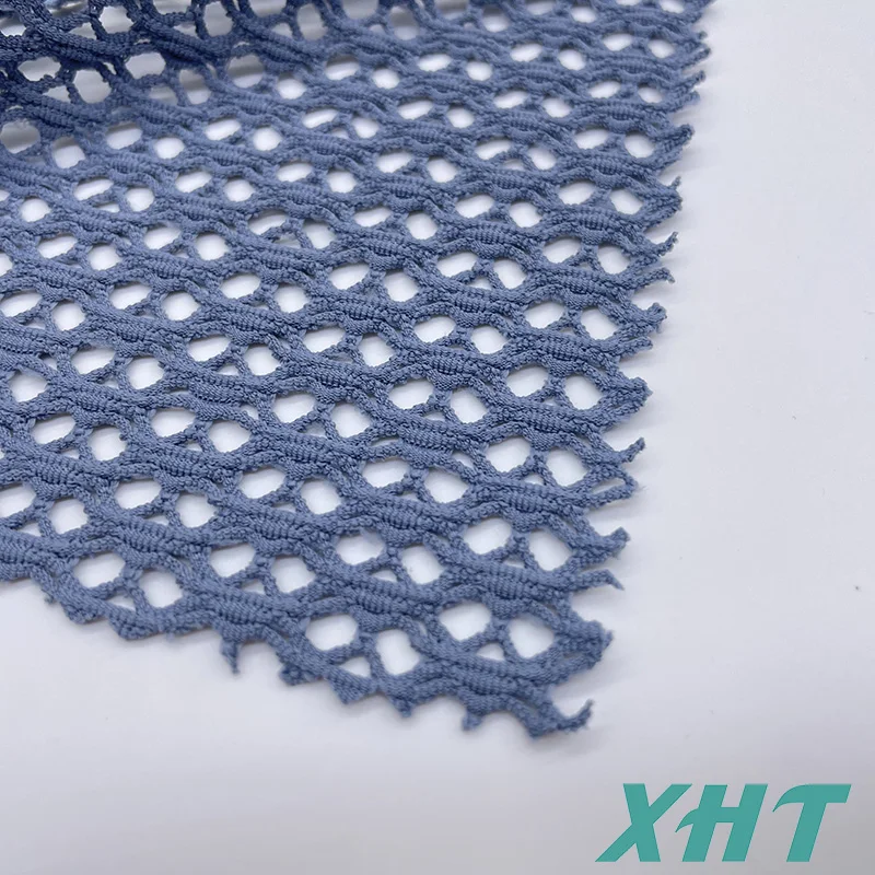 Hot selling color dyeable  hollowed-out eyelets fabric for  swimwear