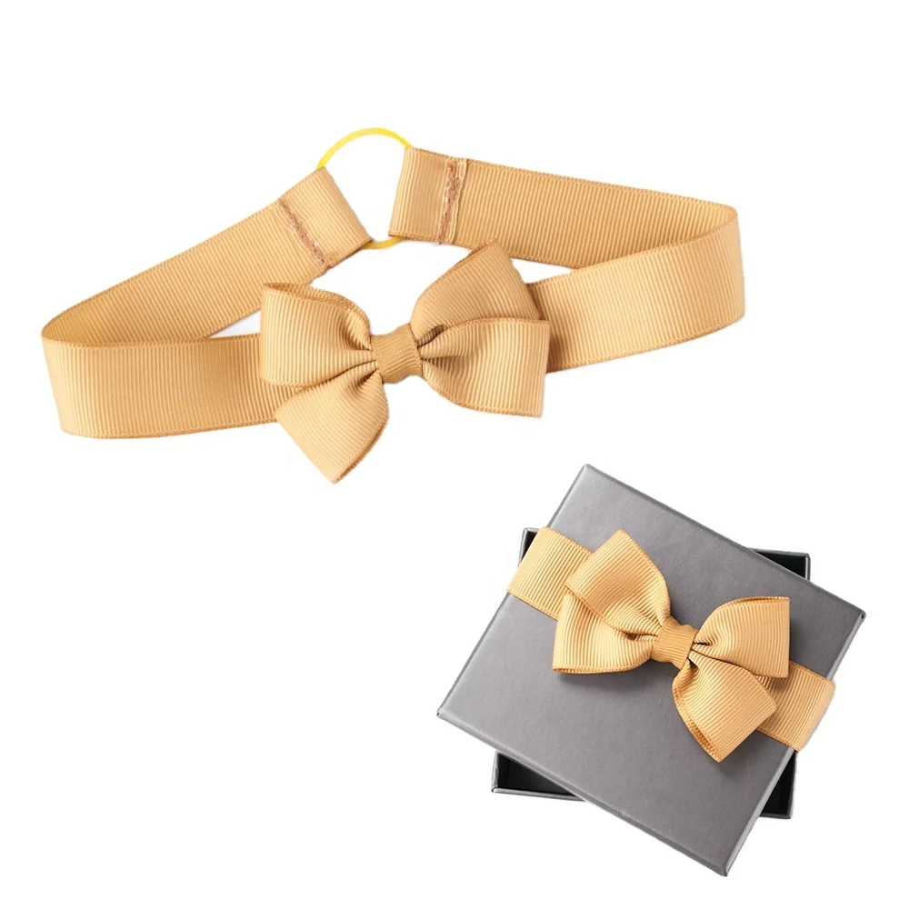 Pre-made grosgrain ribbon bow with elastic loop on back for packing decoration