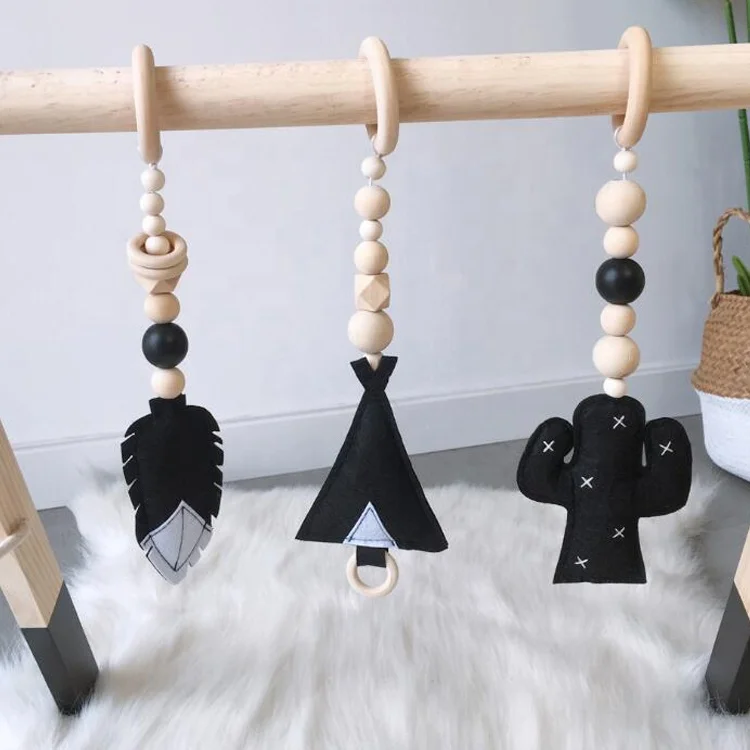 
Hot Selling Plain Portable Safety Material Home Crib Gym Activity Cute No Frame Wooden Baby Hanging Toys 