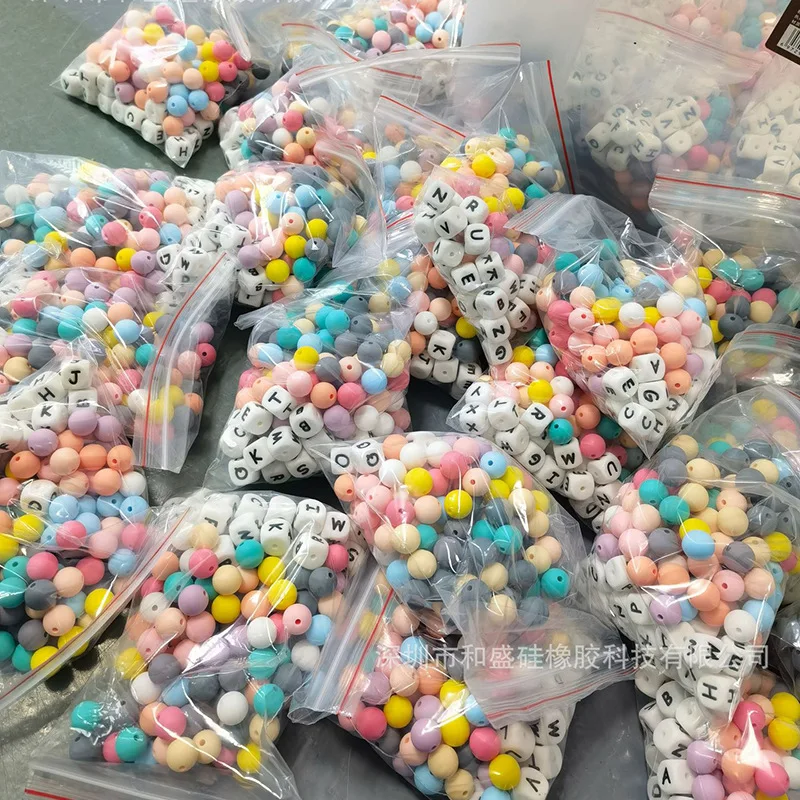 Hot selling products 2024 new custom wholesale bpa free silicone bulk focal bead for keychain making  babies teether pens toys