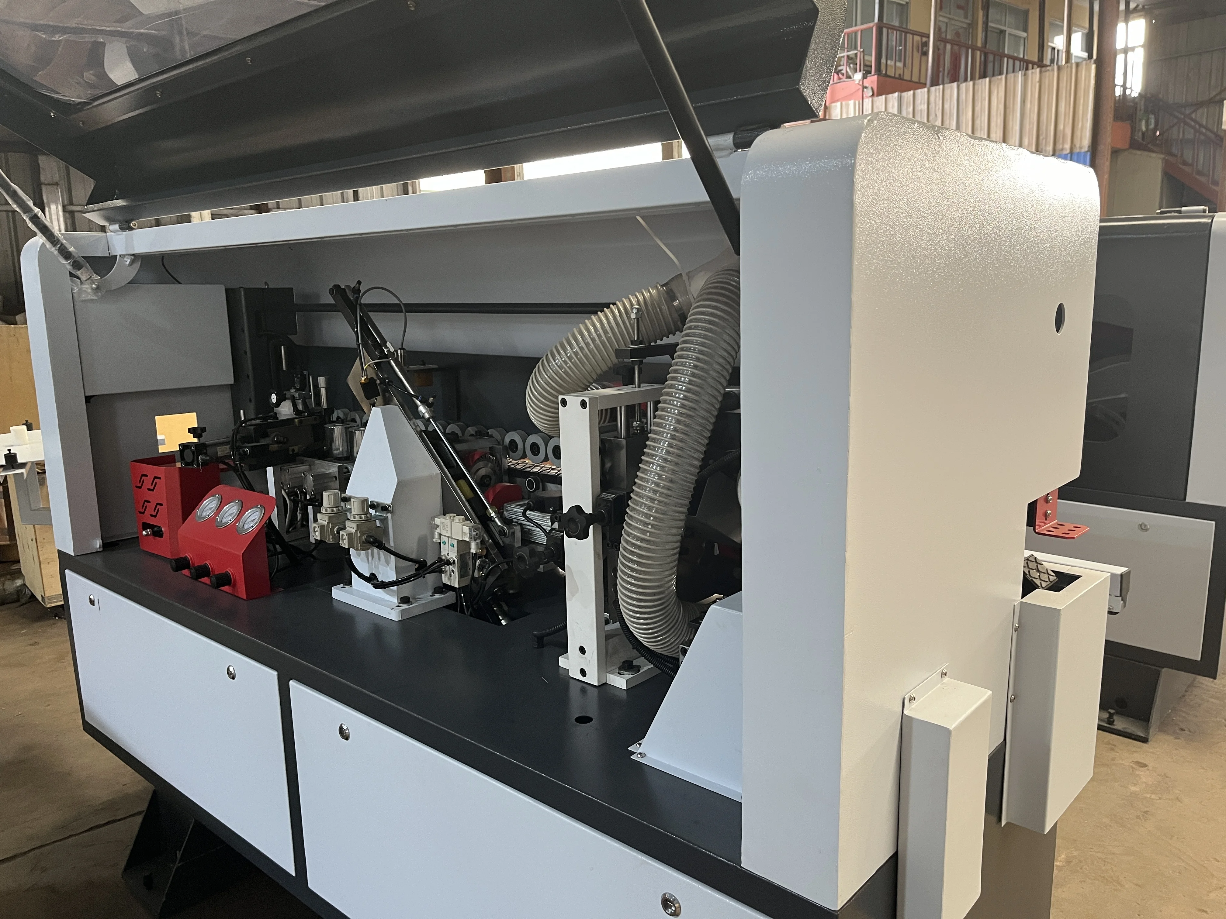 Hot selling fully automatic high-speed medium density fiberboard edge banding machine, four function edge banding manufacturer