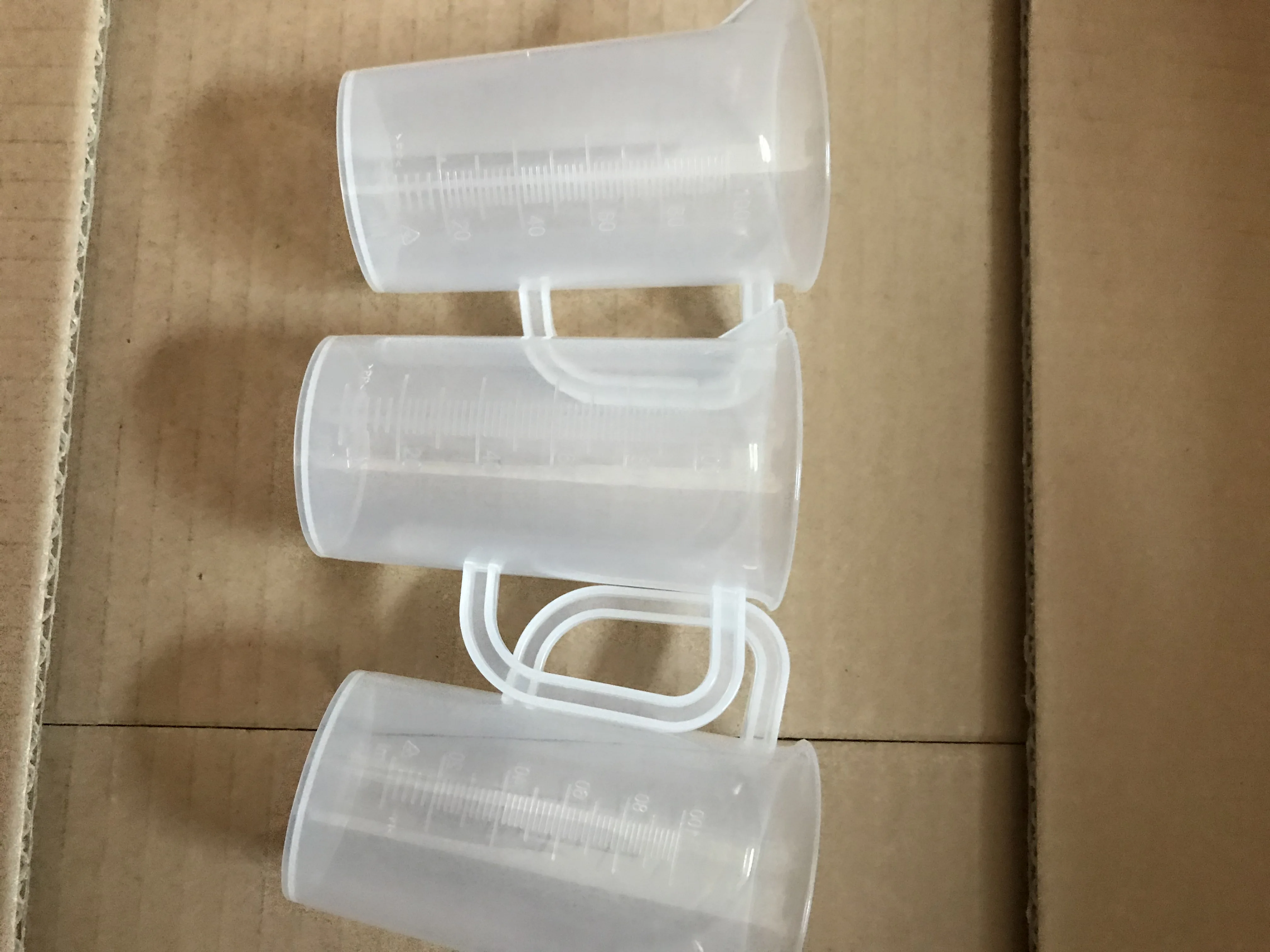 wholesale food grade 100ml small plastic measuring cup MCh100