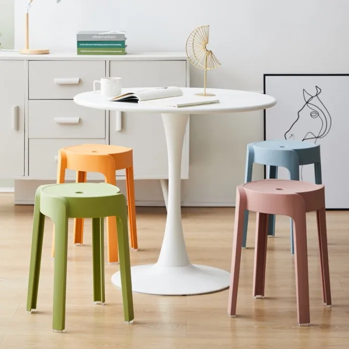 Modern simple plastic color chairs can be stacked in the Office wedding living room and dining room