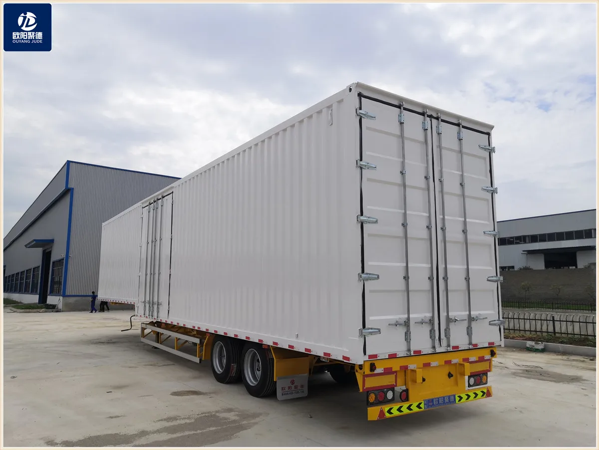 OYJD Trailers new Transnational transport 40ft flatbed trailer van cargo box with 3 brand axles skeleton Chassis