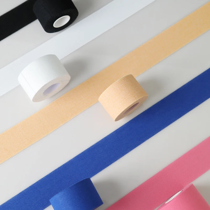 Multi-size OEM Hot Melt/Zinc Oxide Cotton /Rayon Fabric White Serrated Edge Hand Tear Customizable Sports Tape