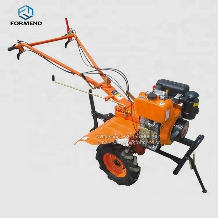 Small farm equipment motor cultivator with plough