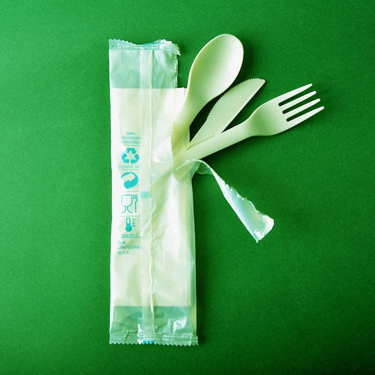 CPLA Polylactic Acid cutlery set with PLA wrap knife fork spoon napkin all in one 100% compostable biodegradable
