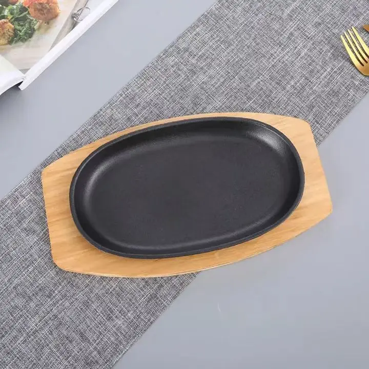 Cast iron western steak pan Iron plate roast pig iron barbecue plate uncoated non-stick oval with wooden iron fork