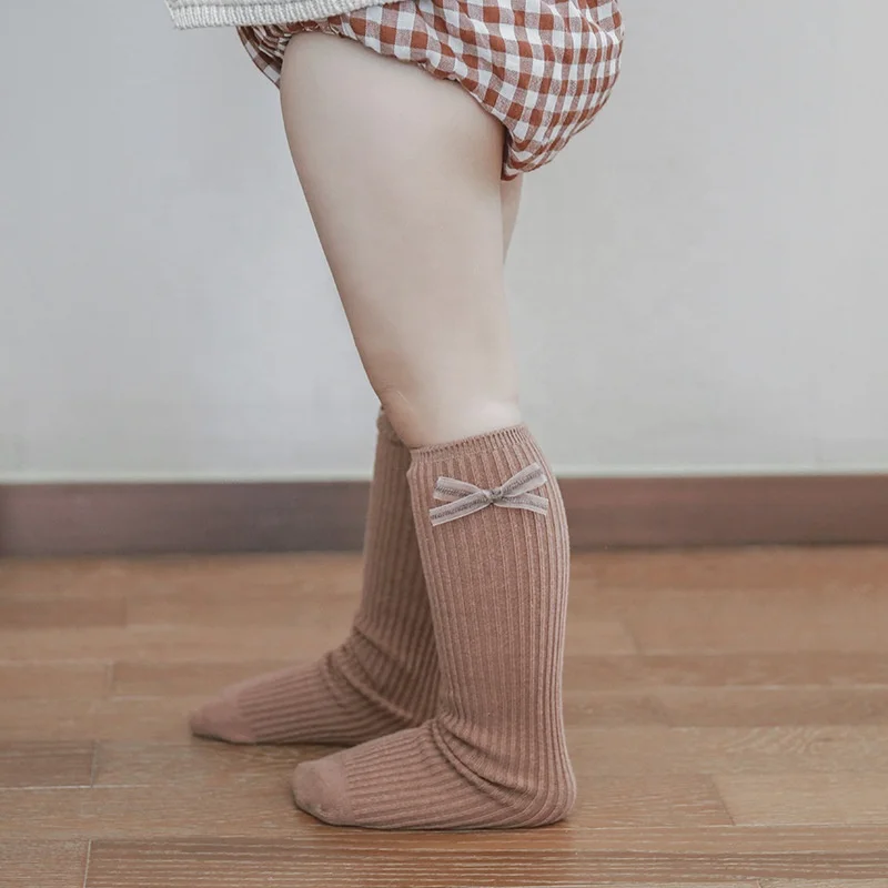 
Eco-friendly low moq solid color long socks cotton soft baby socks 