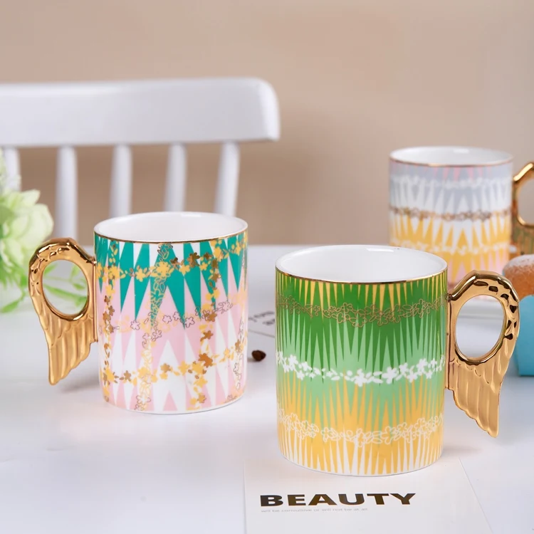 Luxury Gold Painting Angel Wing Handle Ceramic Mugs Wholesale Porcelain Mugs Coffee Cups Mugs With Real Gold Depiction