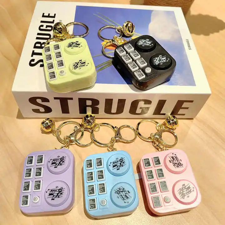 Mini Wind-Up Instrument Keychain Sound Button CD Player Small Gift New Keychain Pendant Bag Claw Machine Wholesale