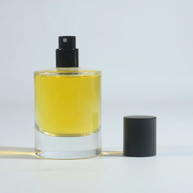 Luxury Heavy Base Glass Perfume Bottle 50ml Cylinder Parfum Botol Empty Glass Fragrance Parfum Spray Bottle With Cap