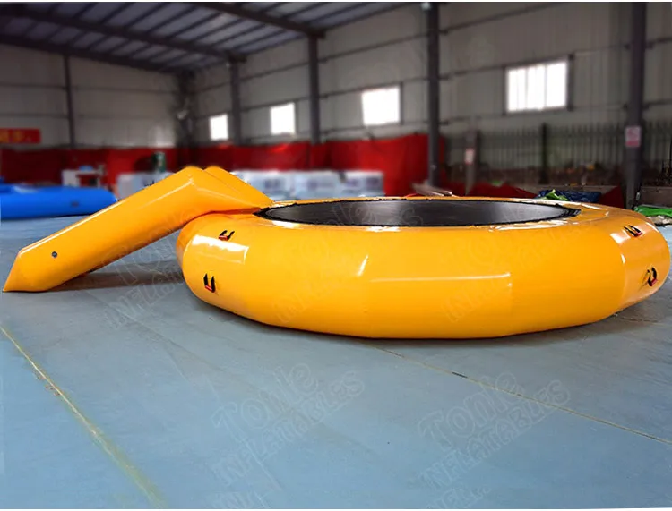 commercial cheap inflatable floating water trampoline with slide for sale